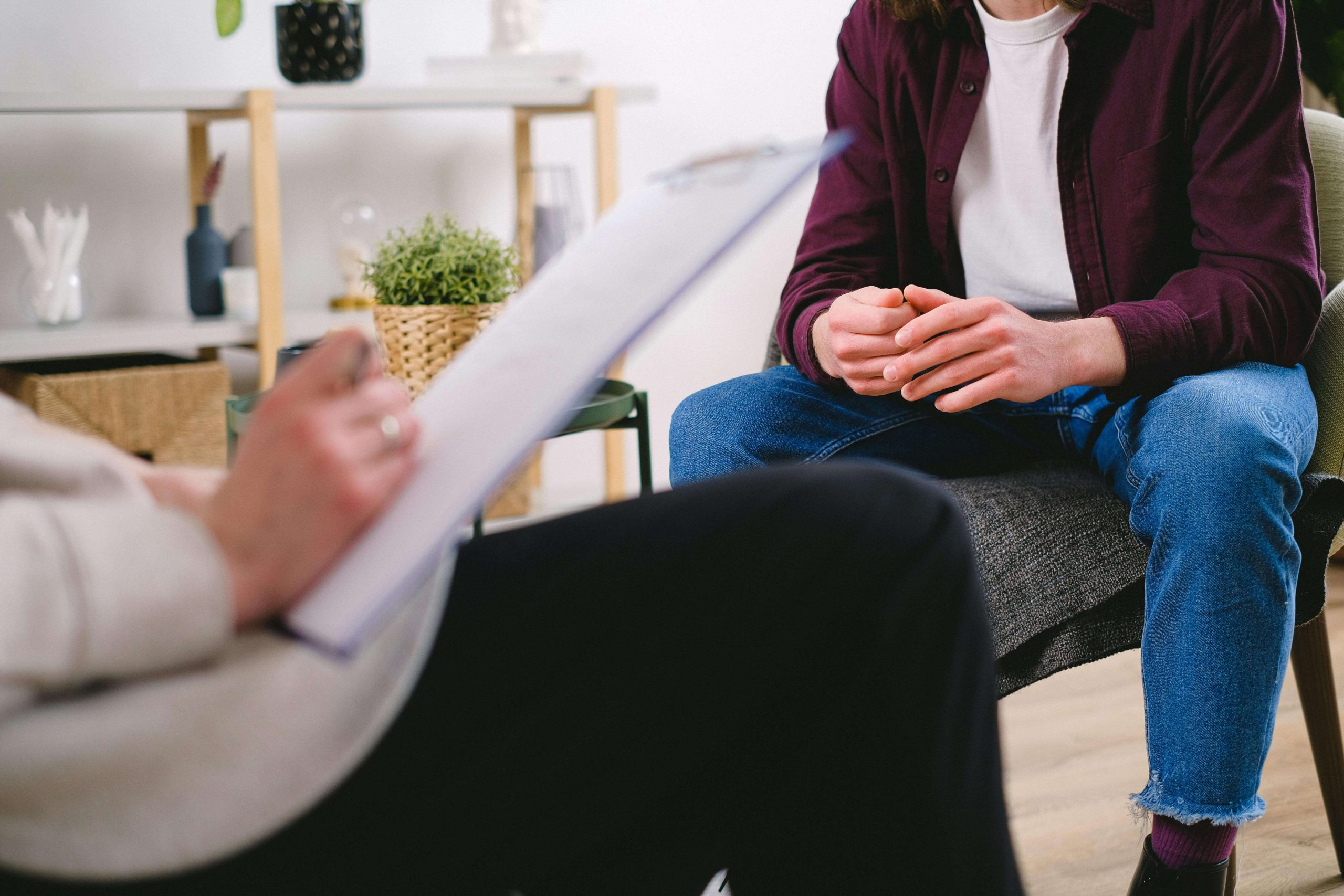 Person in Therapy - ketamine infusion therapy tempe az - psychiatry tempe az - depression therapy tempe az - phx - phoenix - gilbert - scottsdale - mesa - arizona Client speaking with a therapist during a counseling session, illustrating how ketamine infusion therapy in Tempe, AZ can work alongside medication management and therapy.